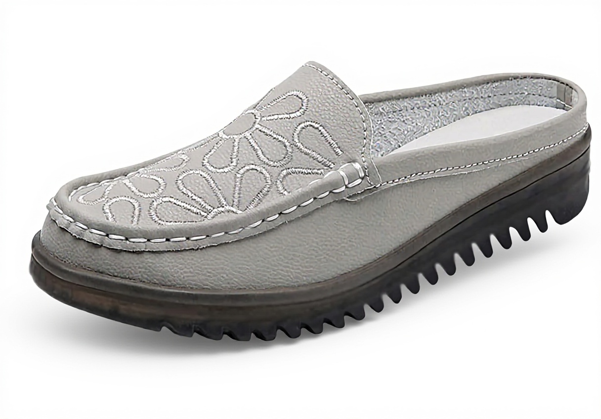 Pavo Monitor Arm installed on a wooden office desk